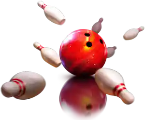 A bowling ball breaks pins